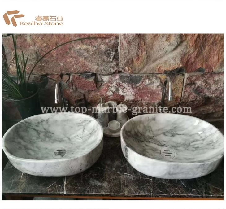 Oval white marble sinks